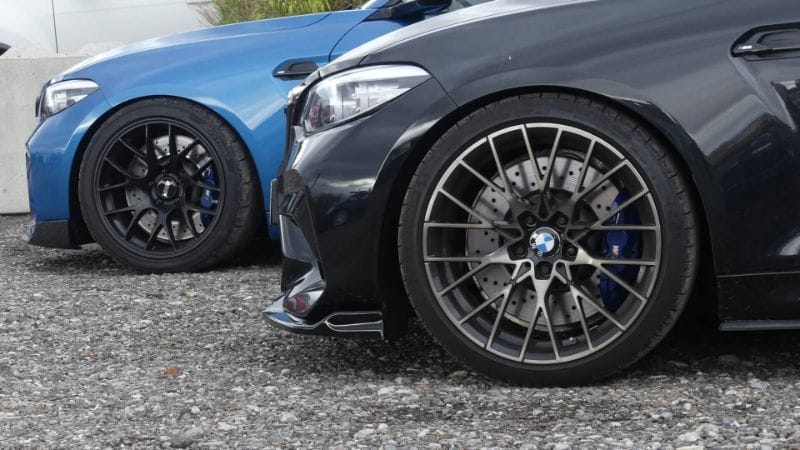 Blue and Black BMW M2 Parked Together